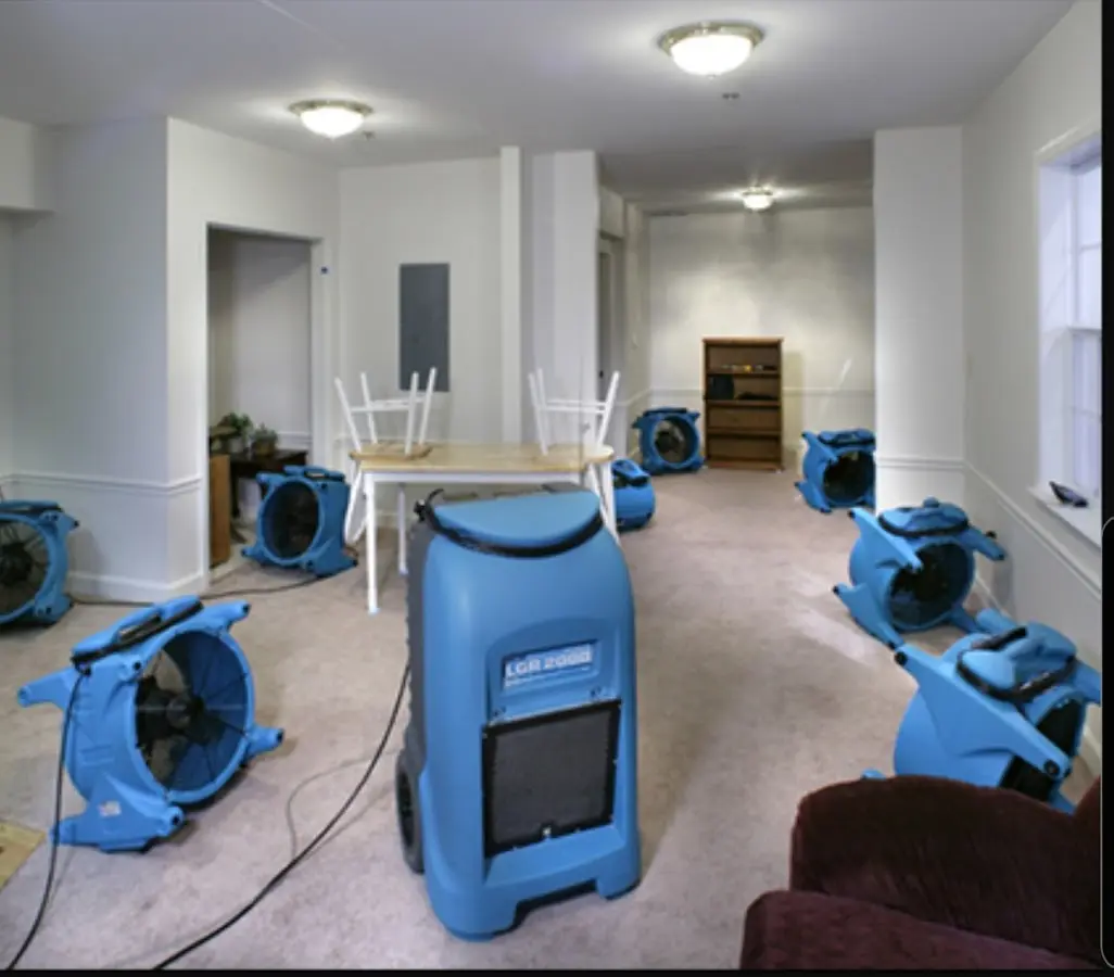 Air movers and dehumidifier setup for Water Damage Restoration in Rotonda